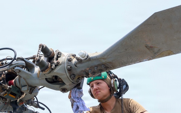 John Finn Washes A Helicopter