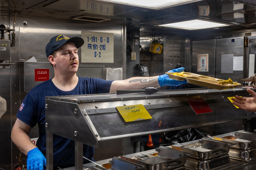 John Paul Jones Sailor Serves Meals