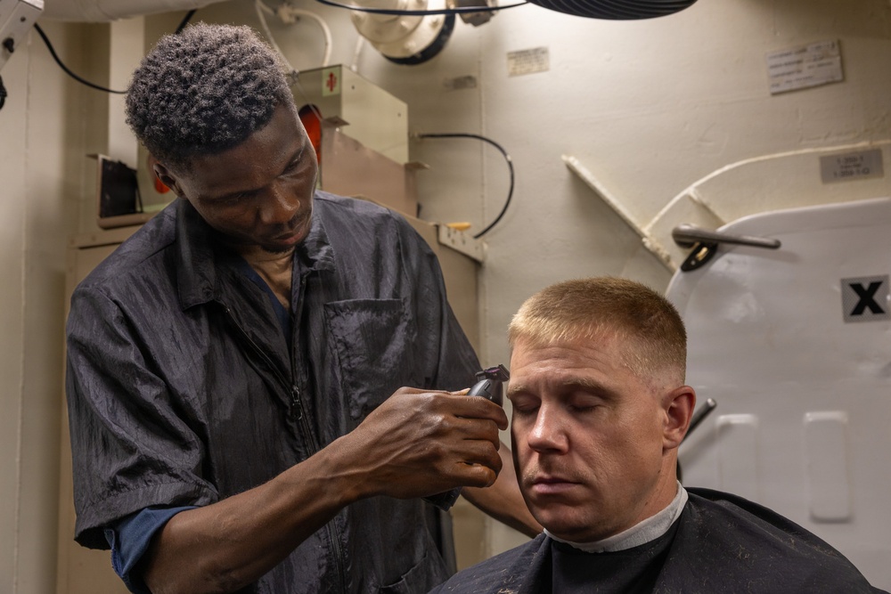 John Paul Jones Sailor Gives Haircut