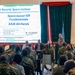 A military briefing is being conducted by Mr. Joe Spegele from the National Security Space Institute on 'Space-based ISR Fundamentals' for an SA26 All-Hands audience in August 2026. The presentation slide is marked UNCLASSIFIED and is affiliated with Space Delta 13 and Space Training and Readiness Command under U.S. Space Forces Europe Africa. An audience of military personnel in camouflage uniforms is seated facing the presenter at a podium.