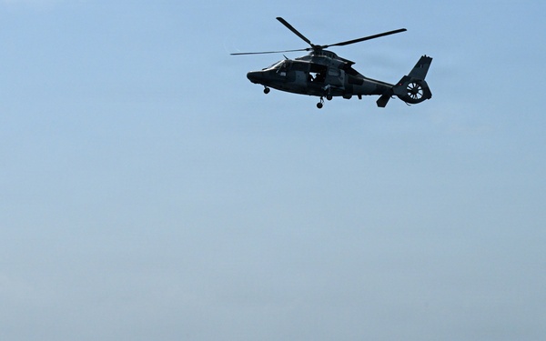 U.S. Coast Guard and partner nations conduct a pursuit exercise at sea during PANAMAX 2026