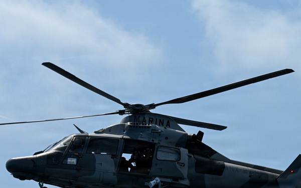 U.S. Coast Guard and partner nations conduct a pursuit exercise at sea during PANAMAX 2026