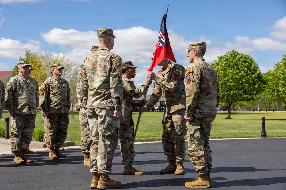 First Sergeant Passes Guidon to Outgoing Commander