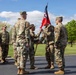 First Sergeant Passes Guidon to Outgoing Commander