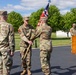 Outgoing Commander Passes Guidon to Brigade Commander