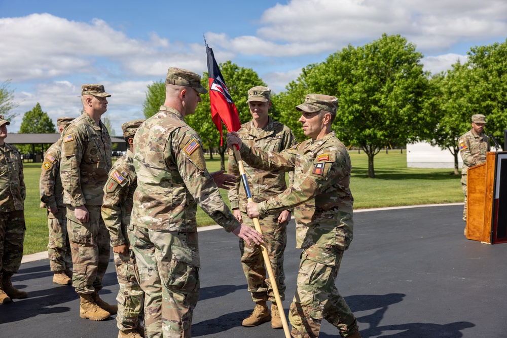 Brigade Commander Passes Guidon to Incoming Commander