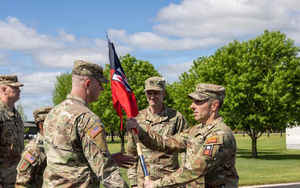 Brigade Commander Passes Guidon to Incoming Commander