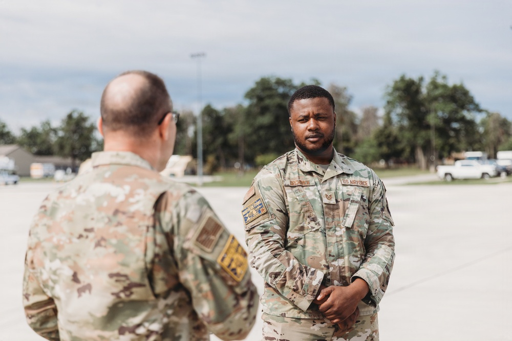 Tech. Sgt. Daveon Upchurch reenlists into the Missouri Air National Guard