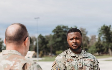 Tech. Sgt. Daveon Upchurch reenlists into the Missouri Air National Guard