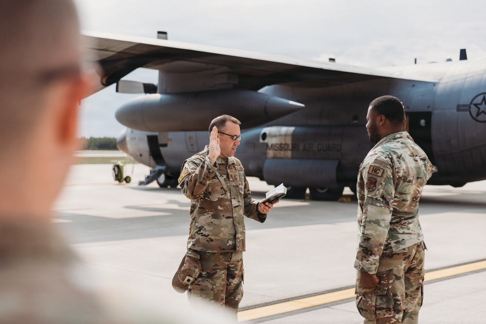 Tech. Sgt. Daveon Upchurch reenlists into the Missouri Air National Guard