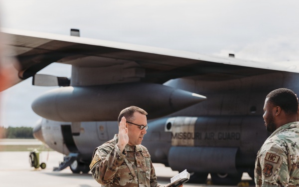 Tech. Sgt. Daveon Upchurch reenlists into the Missouri Air National Guard