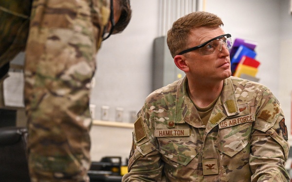 1 SOW commander visits wheel and tire shop