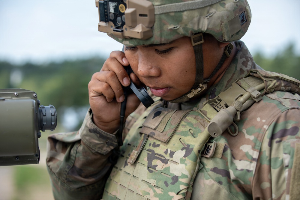U.S. and British soldiers build interoperability as Paladins fire during range training