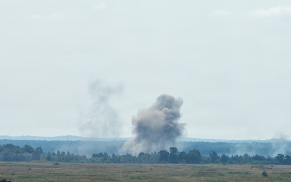 U.S. and British soldiers build interoperability as Paladins fire during range training