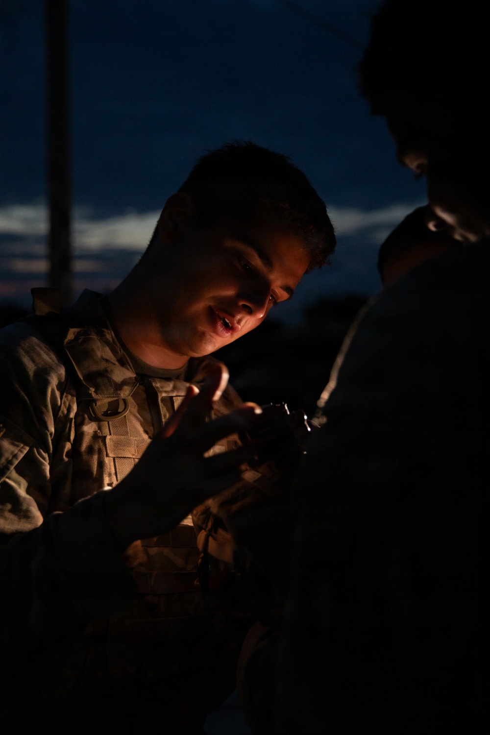 U.S. and British soldiers build interoperability as Paladins fire during range training