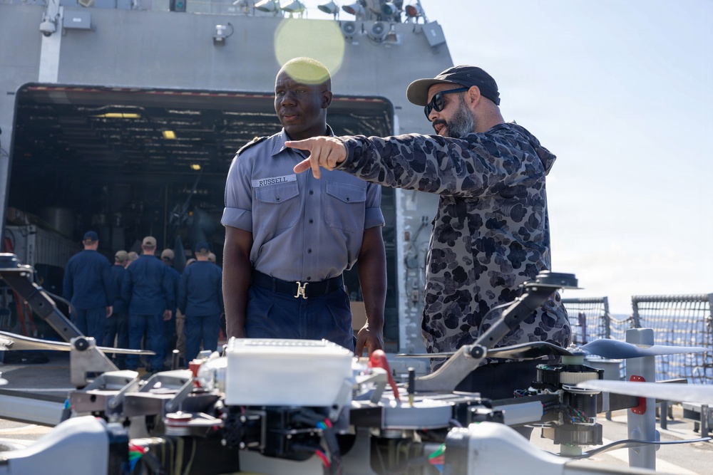RBDF officer and U.S. gov. contractor discuss scan eagle drone