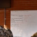 U.S. Marines with 1st LAR prepare for battle carry drills during Coral-Balmoral Cup