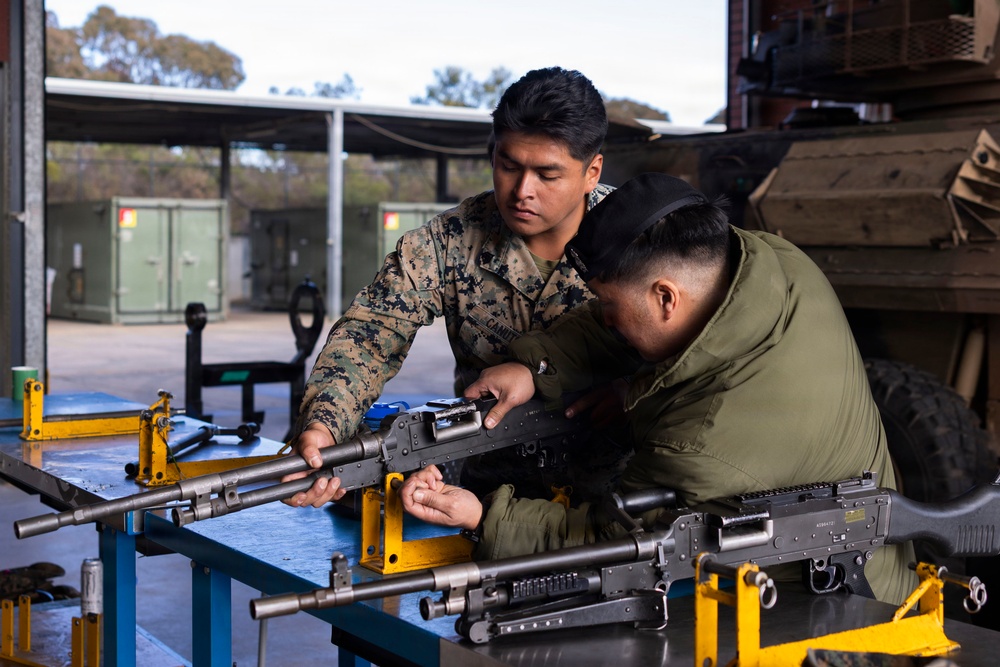 U.S. Marines with 1st LAR prepare for battle carry drills during Coral-Balmoral Cup