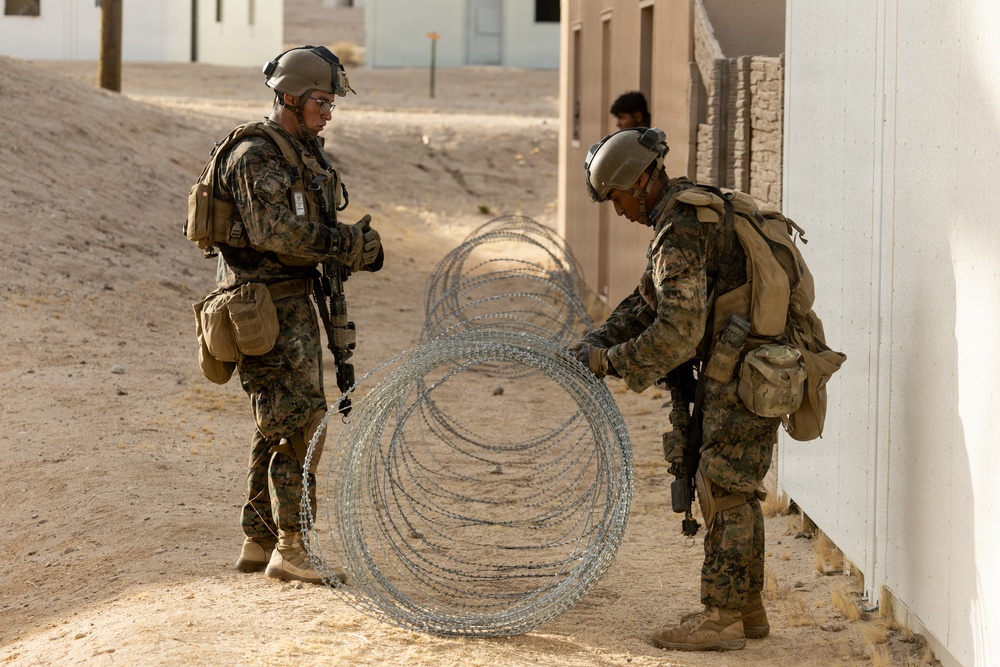 U.S. Marines with 2nd Bn., 1st Marines, participate in force-on-force exercise