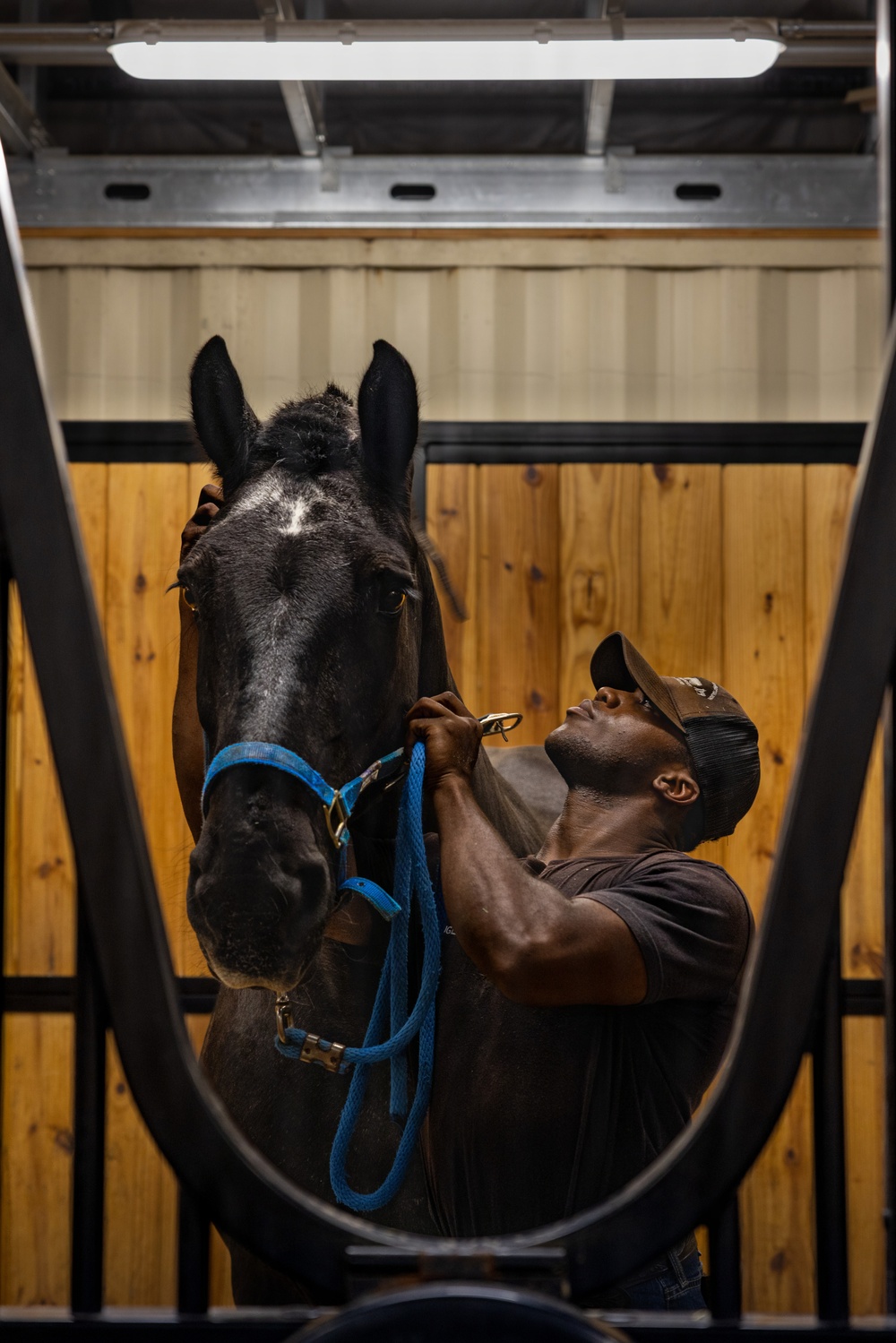 Military Mounted Battalion Soldiers Conduct Stable Duties at Caisson Village