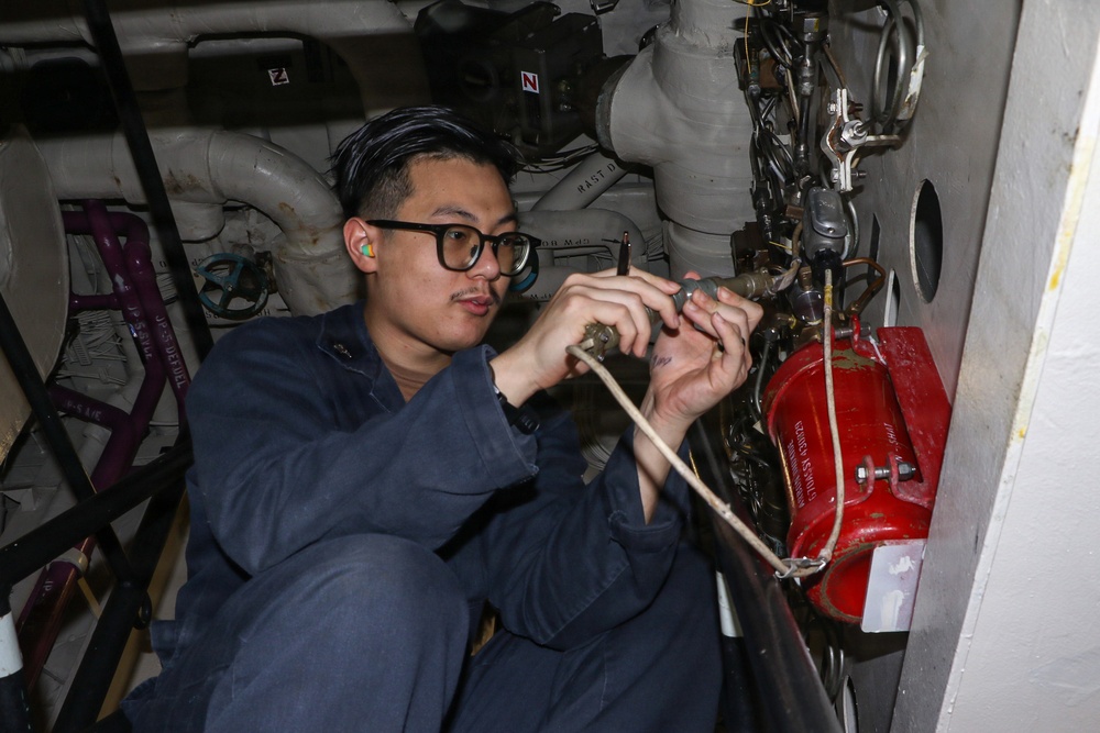 Frank E. Petersen Jr. Sailors Conduct Maintenance