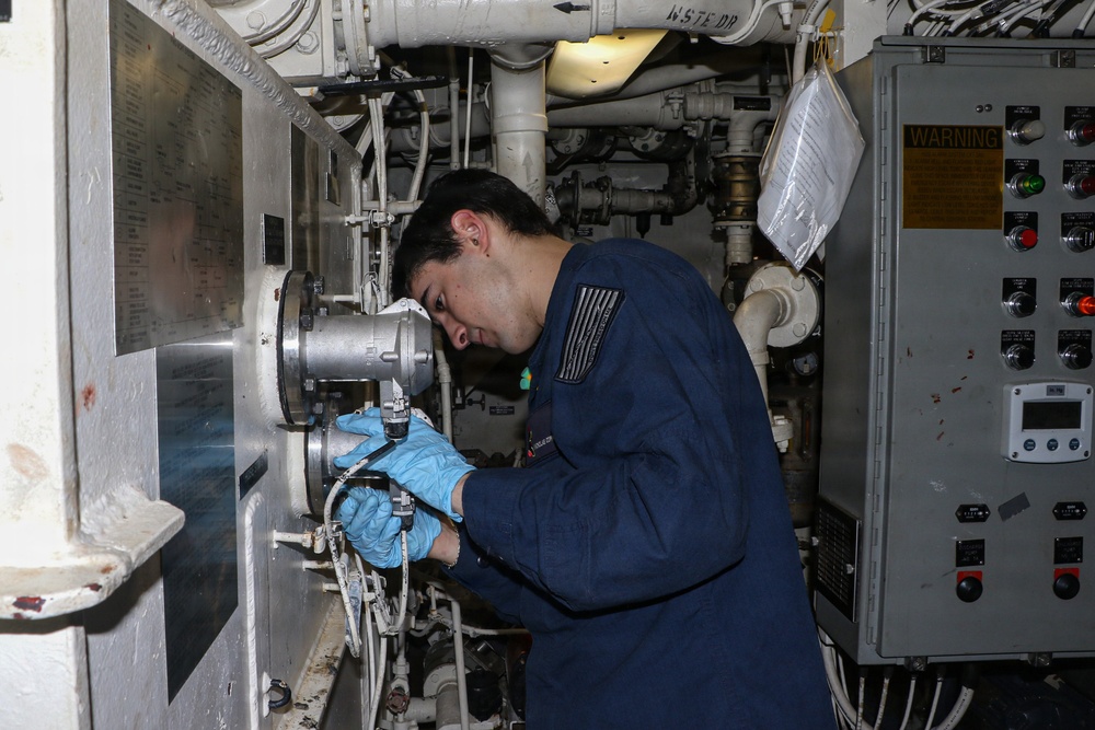 Frank E. Petersen Jr. Sailor Conducts Maintenance