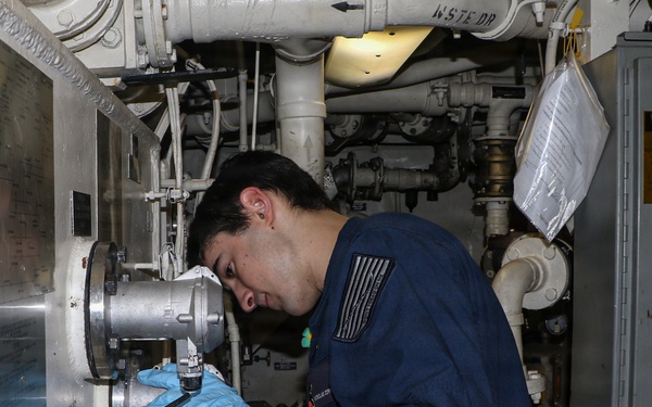 Frank E. Petersen Jr. Sailor Conducts Maintenance