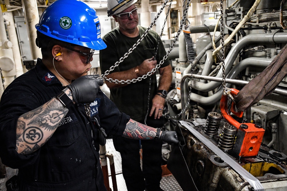 SIMA San Diego Crew Members Refurbish Engine