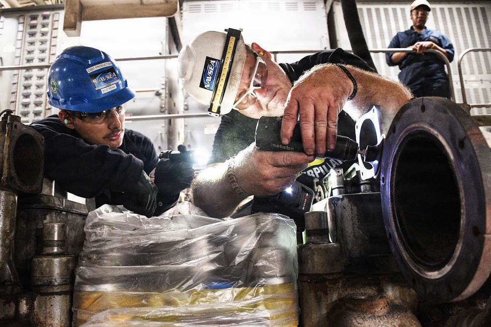 SIMA San Diego Workers Refurbish Engine