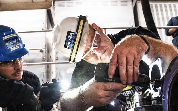 SIMA San Diego Workers Refurbish Engine