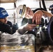 SIMA San Diego Workers Refurbish Engine