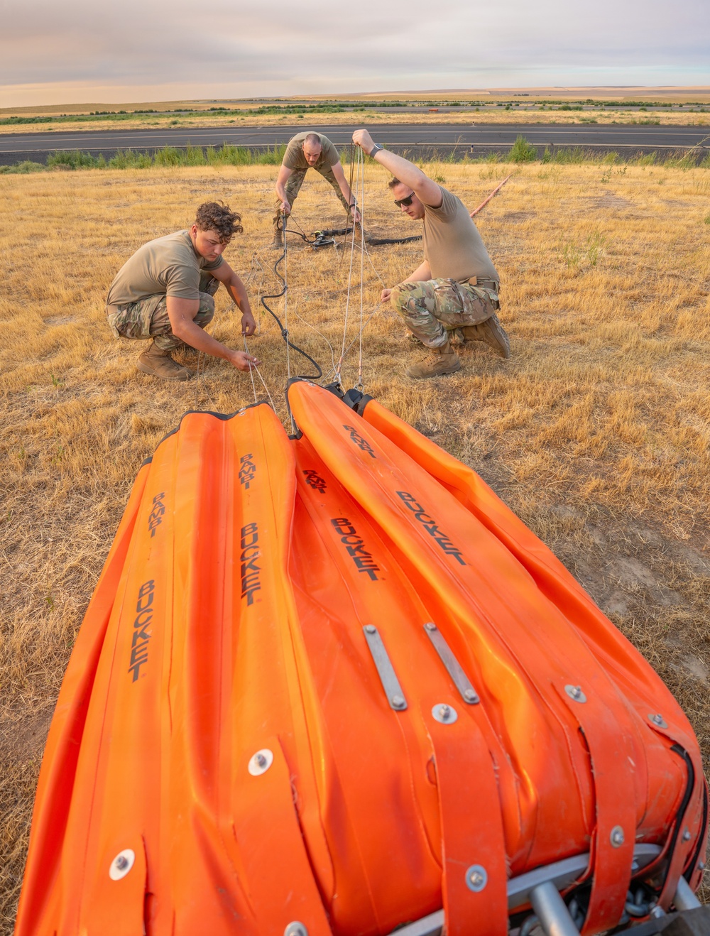 Oregon Guard HH-60 crew drops water on Hagen Fire
