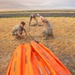 Oregon Guard HH-60 crew drops water on Hagen Fire