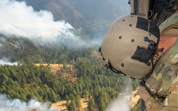 Oregon Guard HH-60 crew drops water on Hagen Fire, saving homes instead of Soldiers