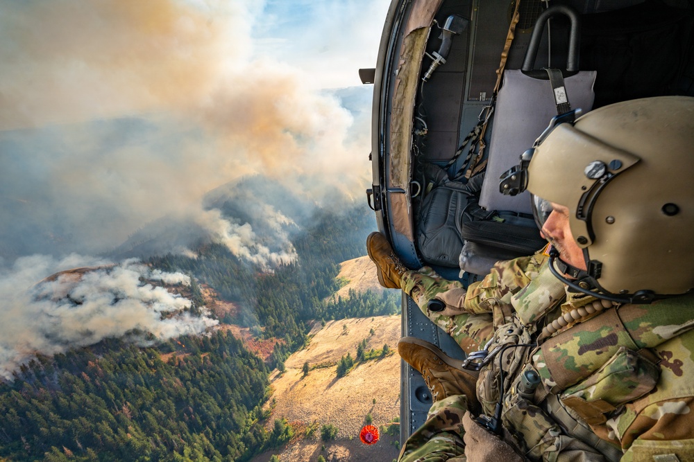 Oregon Guard HH-60 crew drops water on Hagen Fire