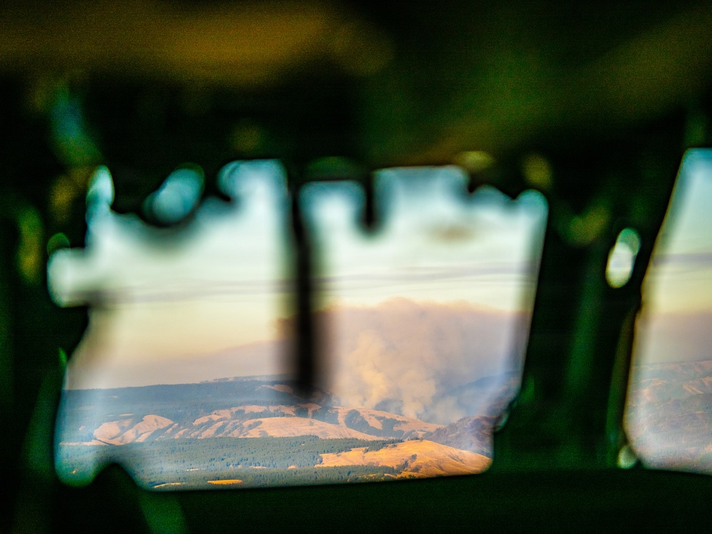 Oregon Guard HH-60 crew drops water on Hagen Fire