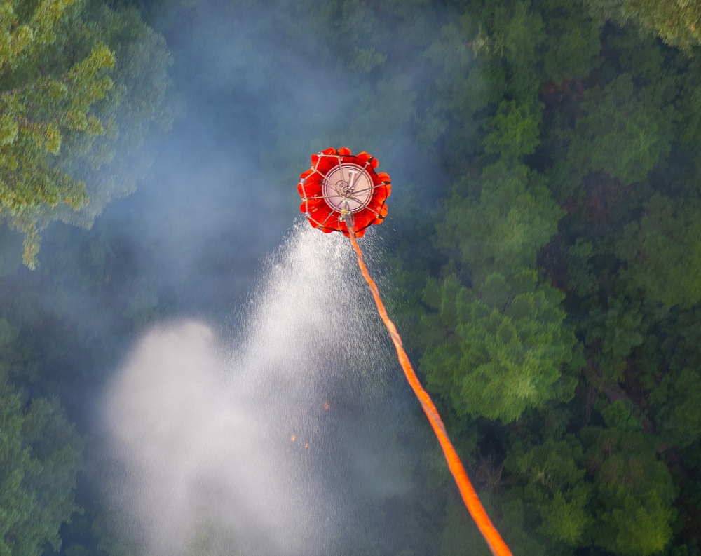 Oregon Guard HH-60 crew drops water on Hagen Fire