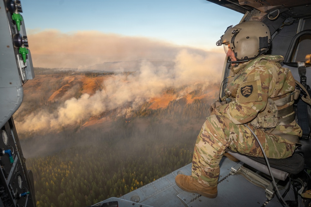 Oregon Guard HH-60 crew drops water on Hagen Fire