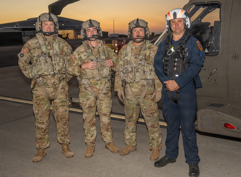 Oregon Guard HH-60 crew drops water on Hagen Fire