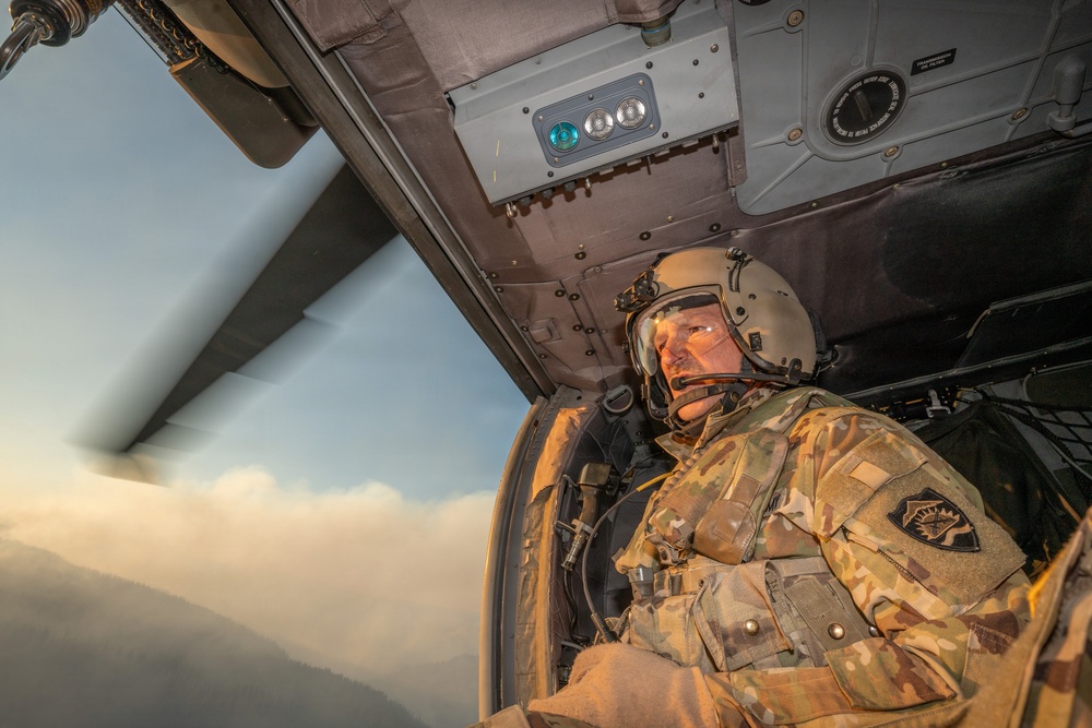Oregon Guard HH-60 crew drops water on Hagen Fire