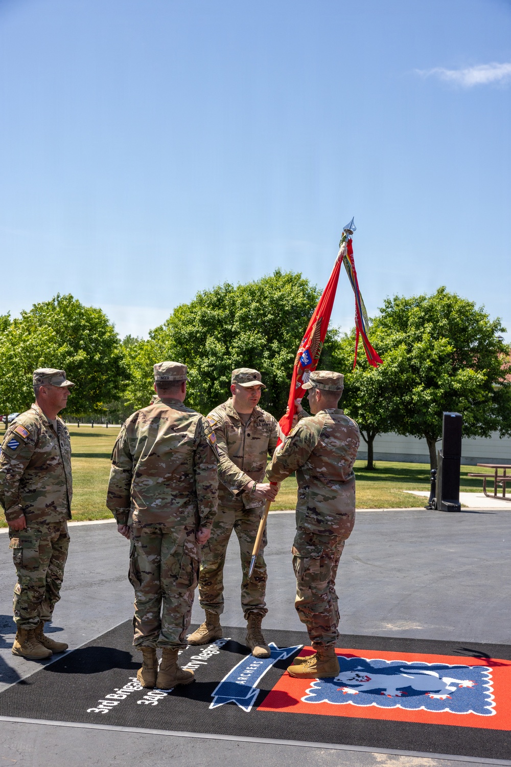 Outgoing Commander Passes Guidon to Brigade Commander