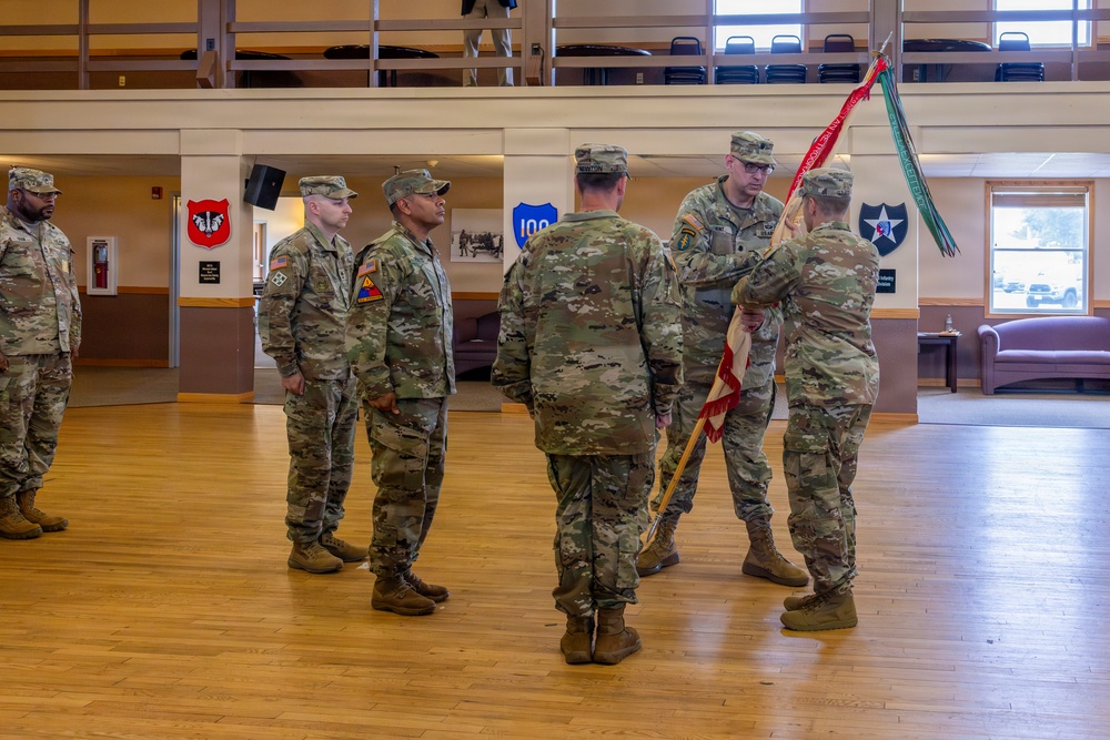 Outgoing Commander Passes Guidon to Brigade Commander
