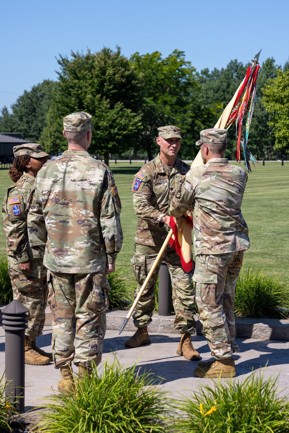 Outgoing Commander Passes Guidon to Brigade Commander