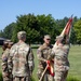 Outgoing Commander Passes Guidon to Brigade Commander