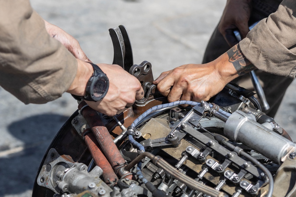U.S. Marines conduct engine repairs for CH-53 Super Stallions at MCAGCC