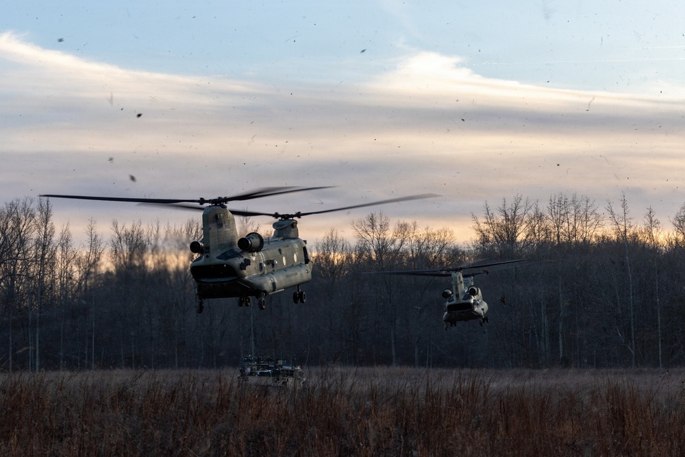 Chinooks Maneuver into Training Area