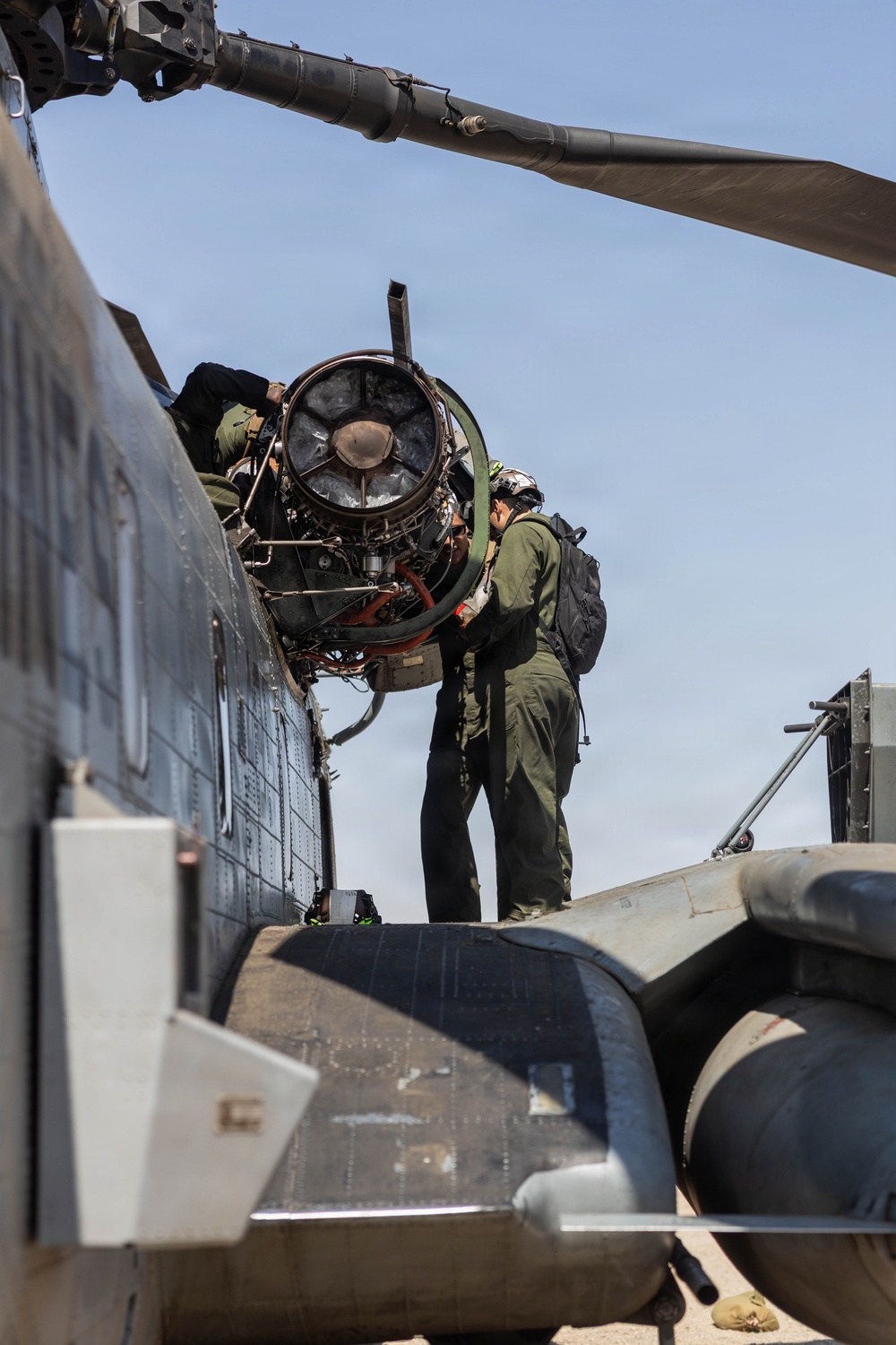 U.S. Marines conduct engine repairs for CH-53 Super Stallions at MCAGCC