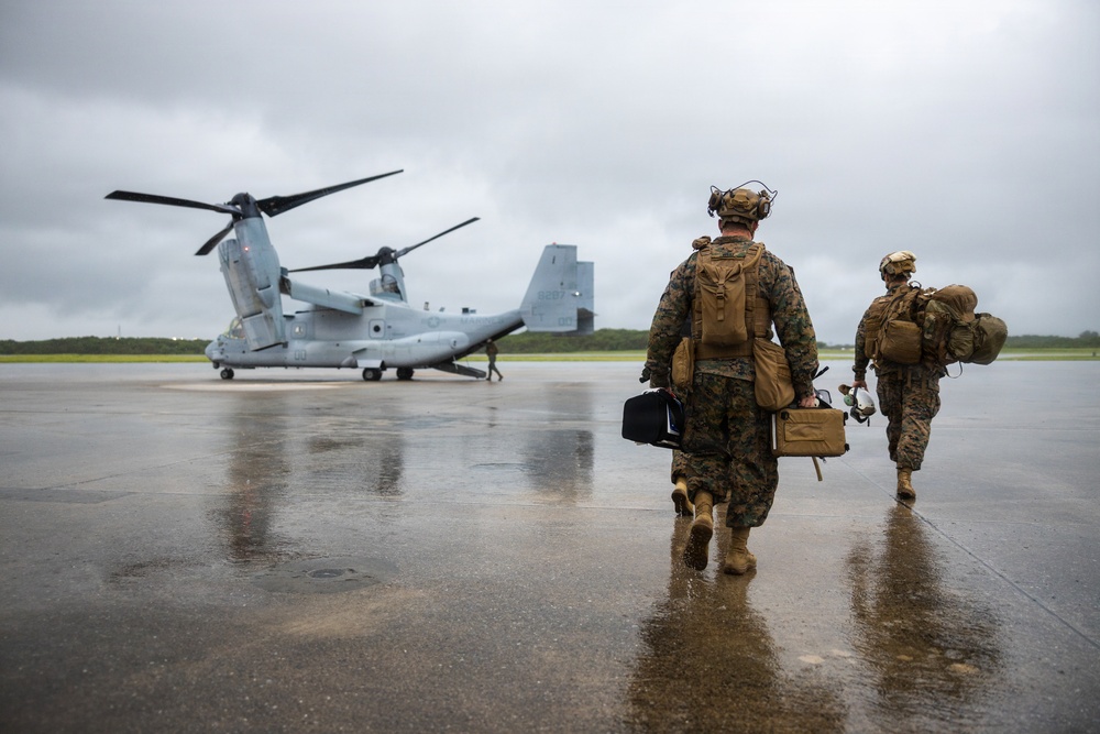 U.S. Marines and Sailors with III Medical Battalion Conduct a Simulated Casualty Evacuation
