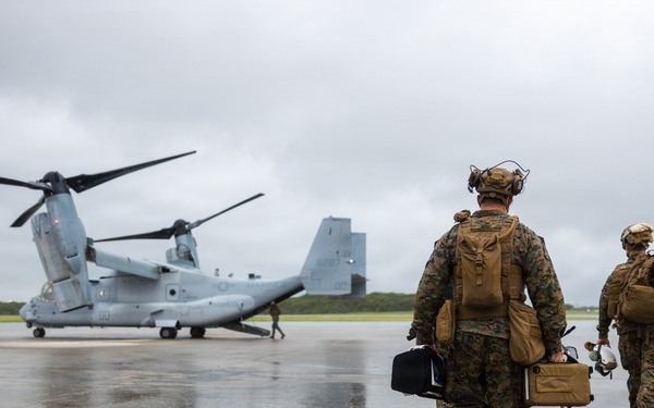 U.S. Marines and Sailors with III Medical Battalion Conduct a Simulated Casualty Evacuation