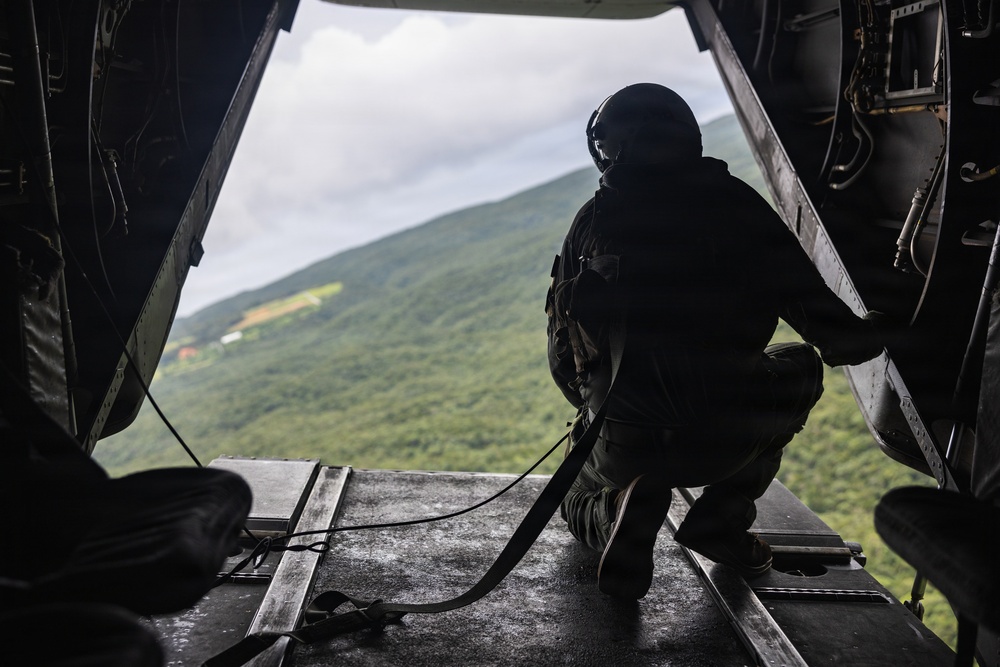 U.S. Marines and Sailors with III Medical Battalion Conduct a Simulated Casualty Evacuation